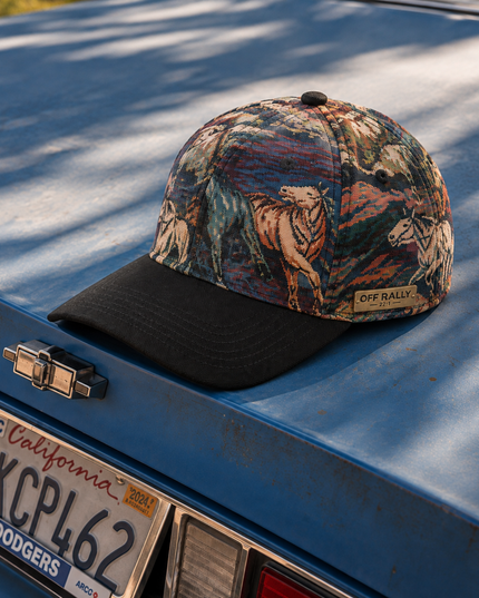 Man wearing the OFF RALLY Outlaw Tapestry Cap in Black